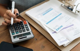 Woman reviewing invoices