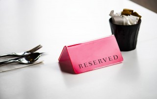 Reserved sign on restaurant table