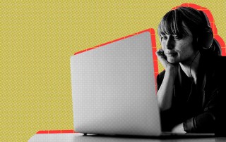 Woman looking at laptop